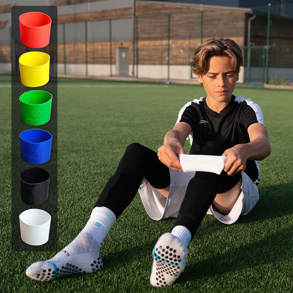Bandes de maintien pour jambières de football en silicone 2pcs